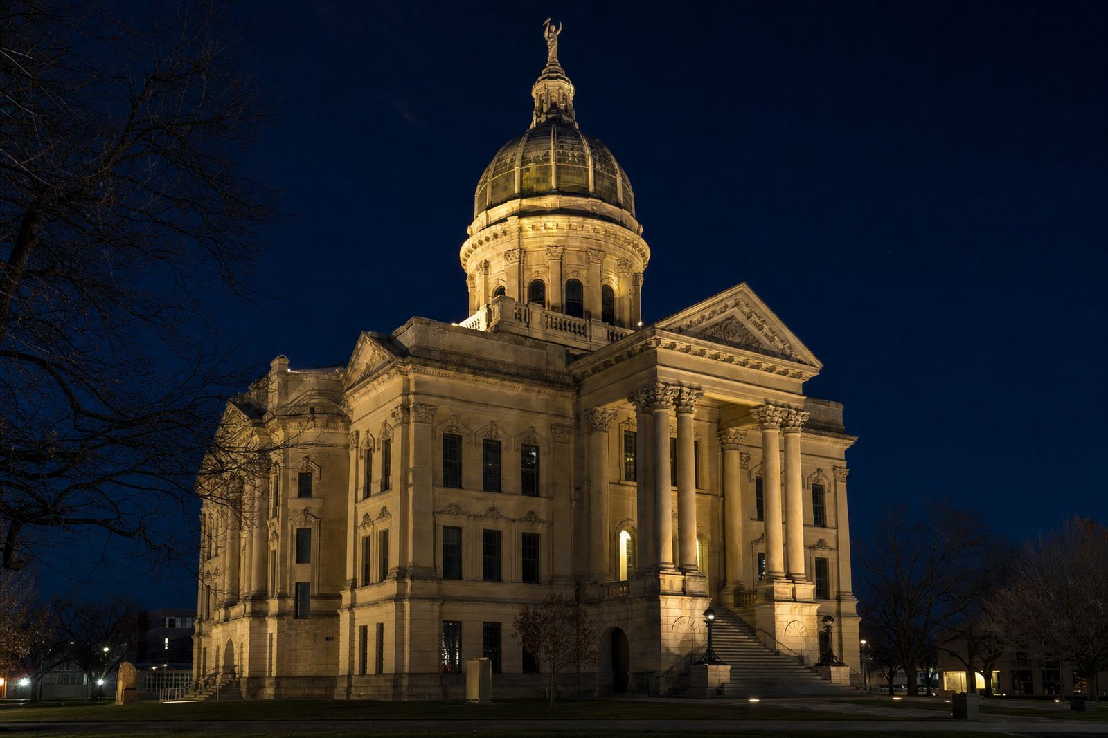 A historic Texas county courthouse with a lit dome at night, similar to the McLennan County Courthouse on Washington Avenue